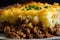 Close-up of a steaming-hot slice of Shepards pie with a crispy, golden-brown mashed potato crust and rich, flavorful meat filling