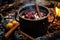 close-up of steaming mulled wine in a pot over a campfire