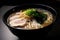close-up of steamy bowl of tonkotsu ramen, with swirls of fragrant broth and noodles