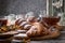 Close up. Still life with freshly baked french croissants, powdered on top white sugar powder