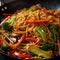 Close-up of Stir-fried Noodles with Mixed Vegetables in a Bowl