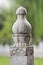 Close up of stone balustrade around a lake