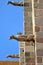 Close-up on stone gargoyles carved on the facade of Saint Vincent Cathedral inside the walled city of Saint Malo