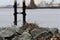 Close up of a stone pier in a harbor basin