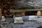 Close up of stone round table and stools in Chinese garden