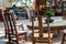 Close up of stone round table and wooden stools in Chinese garden