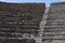 Close up of the stone seats in the Pompeii amphitheatre