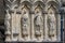 Close up of stone statues on the Great West front of Salisbury Cathedral in Salisbury, Wiltshire, UK