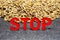 Close-Up Stop Sign On Wheat Grains Background.