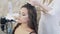 Close-up, stylist works in her beauty salon, a make-up artist, a hairdresser made an evening make-up for the client, and