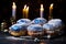 A close-up of sufganiyot, a fluffy and delicious Hanukkah treat that are filled with jelly and dusted with powdered