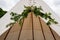 Close up of the summer wedding tipi in a field. Tee pee built on green grass. Traditional teepee tent wigwam located in nature.