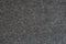 Close-up Surface of dark grey felted fabric texture background