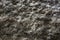 Close-up surface of grindstone, background texture