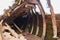 Close up surface of old wooden boat, of old shipyard side.