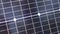 Close up, Surface of a Photovoltaic Solar Panel in Rays of Sunlight at Sunset