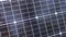 Close up, Surface of a Photovoltaic Solar Panel in Rays of Sunlight at Sunset