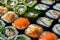 Close Up of Sushi Rolls With Various Toppings, Assortment of sushi rolls wrapped in biodegradable materials, AI Generated