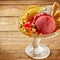 Close up on sweet mango and strawberry ice cream