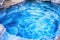 close-up of swirling blue and white hot spring water