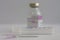 Close up of syringe, on background vial of  antibiotics, injection drugs used in treatment of  patients with pneumonia caused by