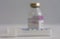 Close up of syringe, on background vial of  antibiotics, injection drugs used in treatment of  patients with pneumonia caused by