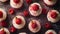 A close up of a table with cupcakes and raspberries on it, AI