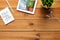 Close up of tablet pc with news on wooden table