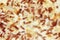 Close up of taditional food `Tarte Flambee` or `Flammkuchen` from German-French Alsace border region