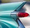 Close up, tail fin and lights of American classic car.