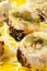 Close-Up of tandoori paneer stuffed potato with potato, cheese  with cottage cheese and cream and garnished with cabbage and
