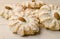 Close up of tasty cookies, sprinkled with powdered sugar, isolated on wooden background