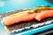 Close up of tasty japanese uramaki sushi with salmon