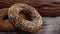 Close up of tasty organic bagels with sesame and flax