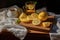 close-up of tea bags, lemon slices, and sugar on a wooden tray