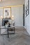 close-up of a tea table setting in a modern living room with a marble fireplace in a chic bright interior of a huge apartment