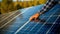 Close-up Technician\\\'s hand on a solar panel.