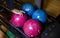 Close-up on teen children hand holding bowling ball against bowling alley - Image. Cheerful Kids are  ready to play - Image.  The