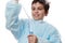 Close-up teenage boy, chemist scientist, filling graduated pipette with chemical substance from a measuring lab cylinder