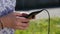 Close up of the teenager hands with a smartphone