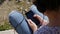 Close up of the teenager hands with a smartphone