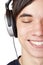 Close-up teenager listen to music with headphone