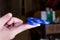 Close-up of teenager spinning a fidget spinner on finger