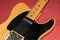 Close up of a Telecaster natural electric guitar