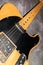 Close up of a Telecaster natural electric guitar