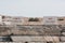 Close up of the Temple D`Apollon/Naos Appolonos `The Sanctuary of Apollo` signs on the island of Delos, Greece