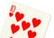 Close up of a ten of hearts playing card.