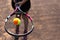 Close-up of tennis ball on racket in hands of player.