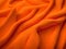 close up texture of orange silk