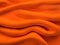 close up texture of orange silk